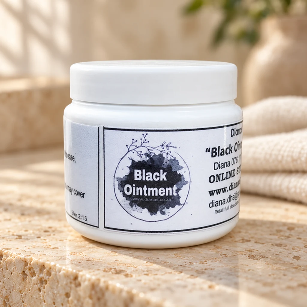 Black Ointment (Natural Drawing Ointment) — Diana's product in a warm stone editorial setting